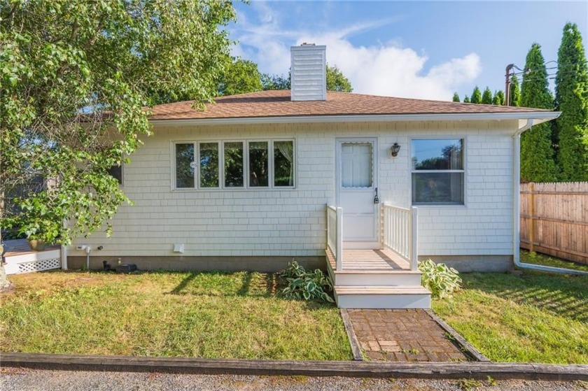 This charming Cottage offers comfortable living with two - Beach Home for sale in Narragansett, Rhode Island on Beachhouse.com