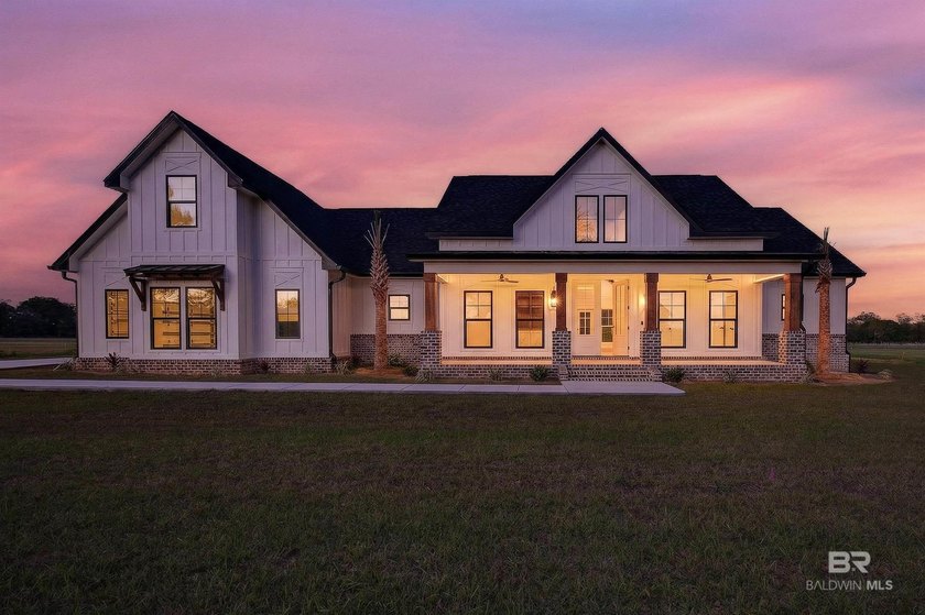 This beautifully crafted, custom-built farmhouse seamlessly - Beach Home for sale in Foley, Alabama on Beachhouse.com