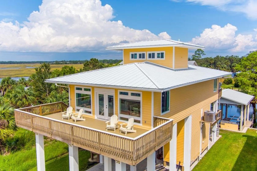 Stunning Waterfront Retreat with Gulf Views. Welcome to this - Beach Home for sale in Suwannee, Florida on Beachhouse.com