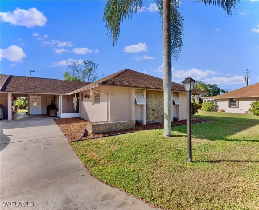 Welcome home to this meticulously maintained & magnificently - Beach Home for sale in Lehigh Acres, Florida on Beachhouse.com