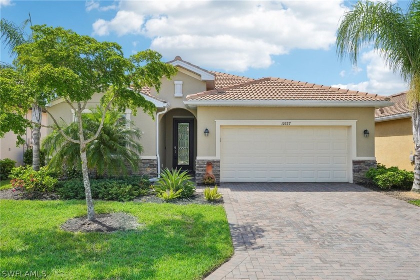 Nestled within the heart of Pelican Preserve, this stunning home - Beach Home for sale in Fort Myers, Florida on Beachhouse.com