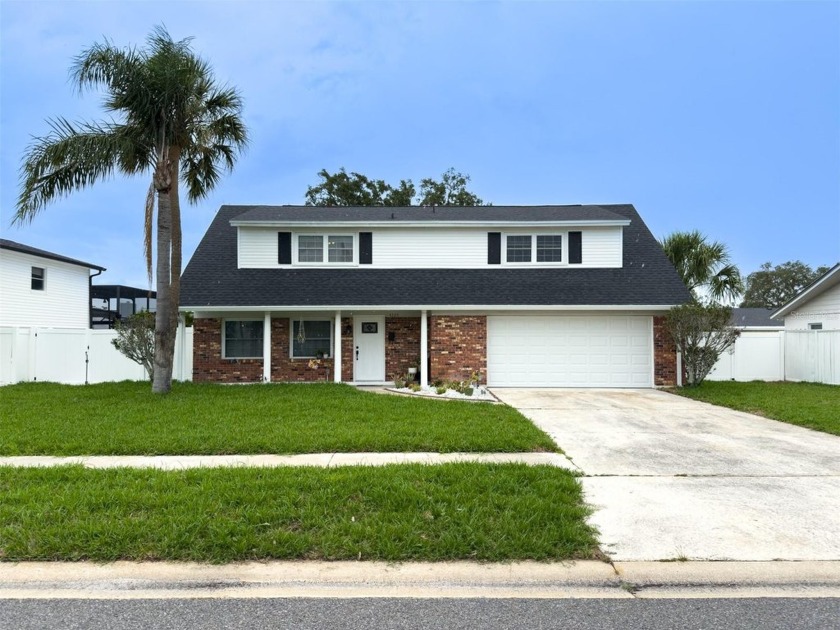 This 4 bedroom, 2 1/2 bath home is located in the sought after - Beach Home for sale in Tampa, Florida on Beachhouse.com