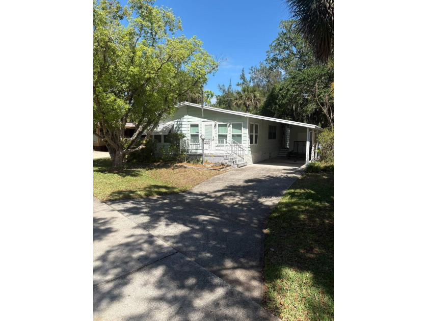 Tucked into the serene, greenery-filled setting of Indian Oaks - Beach Home for sale in Rockledge, Florida on Beachhouse.com