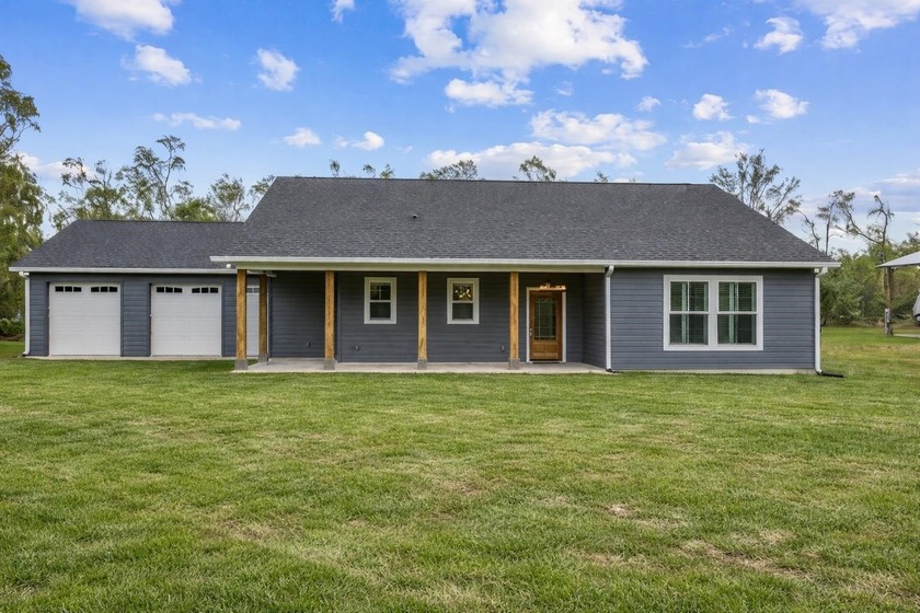 Exquisitely crafted in 2023, this hurricane-resistant 2-bedroom - Beach Home for sale in Perry, Florida on Beachhouse.com