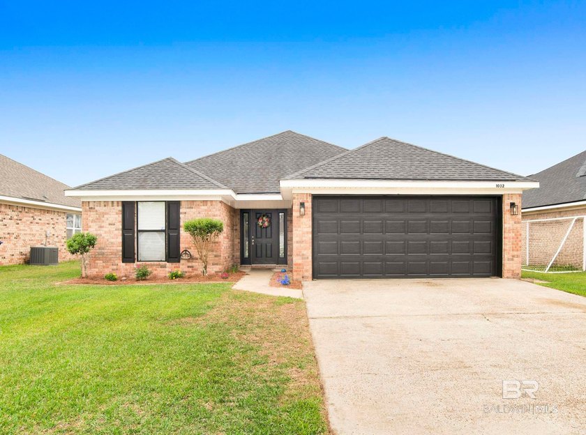 This charming 3-bed, 2-bath brick home offers both comfort and - Beach Home for sale in Foley, Alabama on Beachhouse.com