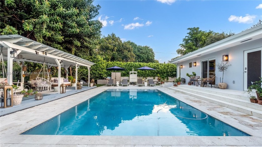 Completely remodeled and expanded, this 4-bedroom, 3.5-bath home - Beach Home for sale in Biscayne Park, Florida on Beachhouse.com