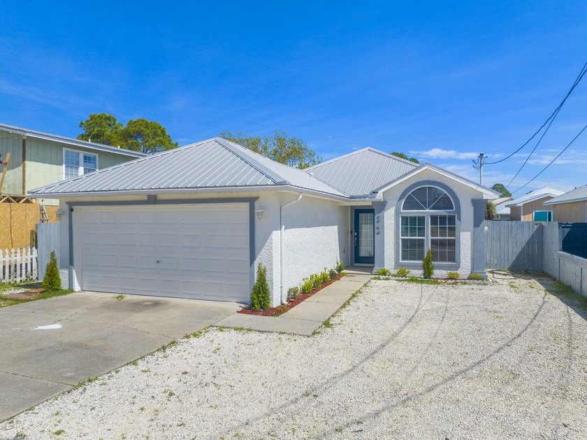 HIGH-DEMAND LOCATION MEETS TURN-KEY INCOME POTENTIAL with this - Beach Townhome/Townhouse for sale in Panama City, Florida on Beachhouse.com