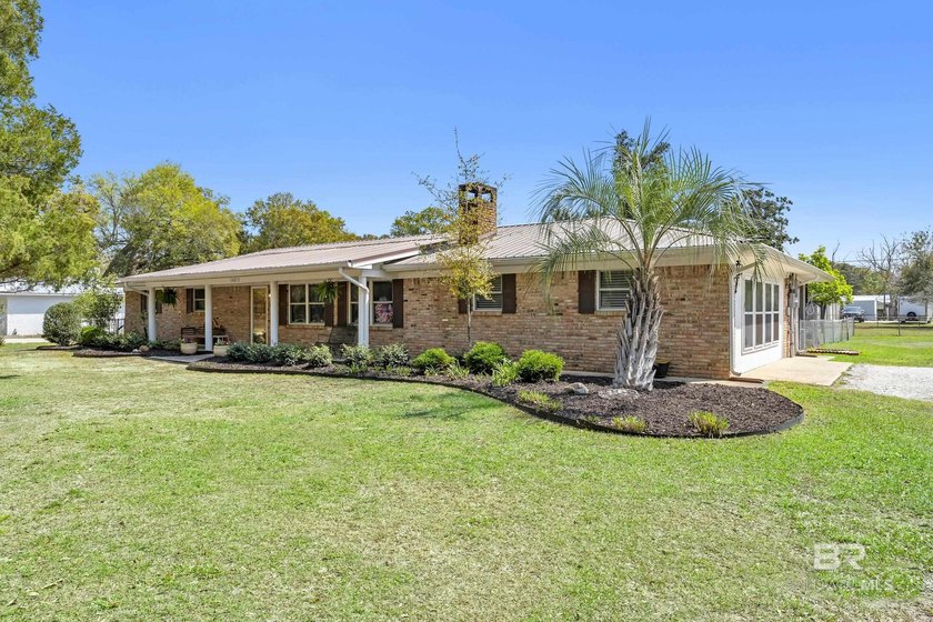 This well maintained, updated 4 BR, 3BA ranch-style home sits on - Beach Home for sale in Gulf Shores, Alabama on Beachhouse.com