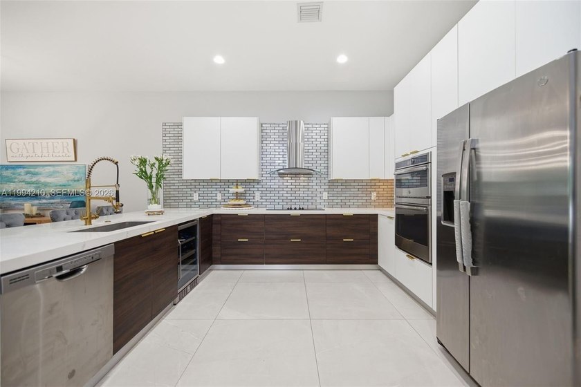 Step into refined South Florida living in this 2020 impeccably - Beach Home for sale in Dania, Florida on Beachhouse.com