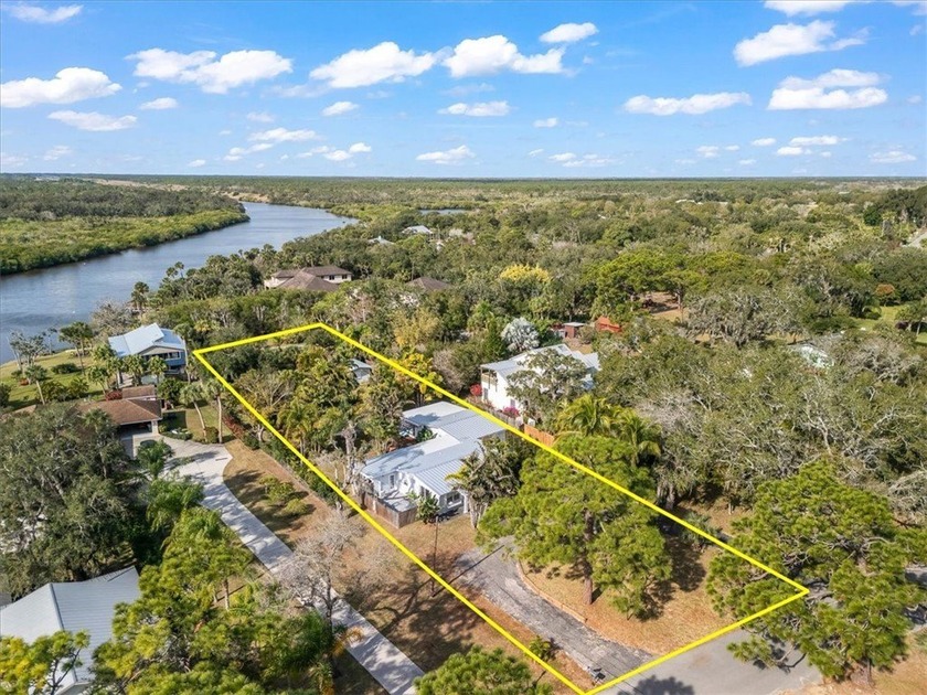 River Views & Meticulous Upgrades on .7 acres! Charm & peace of - Beach Home for sale in Sebastian, Florida on Beachhouse.com