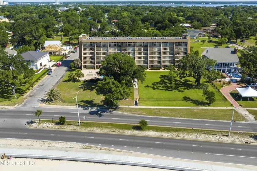 SIT ON RHE BALCONY ON THIS FOURTH FLOOR UNIT AND ENJOY THE - Beach Condo for sale in Biloxi, Mississippi on Beachhouse.com