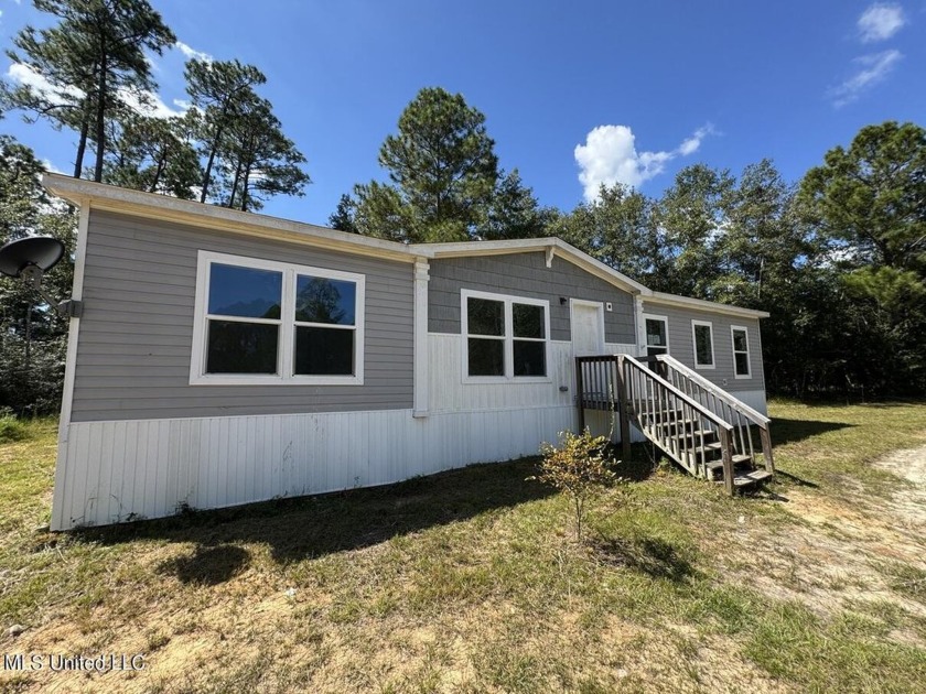 The best of both worlds. Secluded acreage in country atmosphere - Beach Home for sale in Long Beach, Mississippi on Beachhouse.com