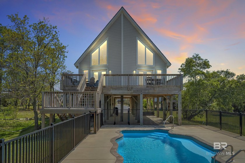 This amazing LAGOON FRONT home has it all, BEAUTIFUL VIEWS, an - Beach Home for sale in Gulf Shores, Alabama on Beachhouse.com