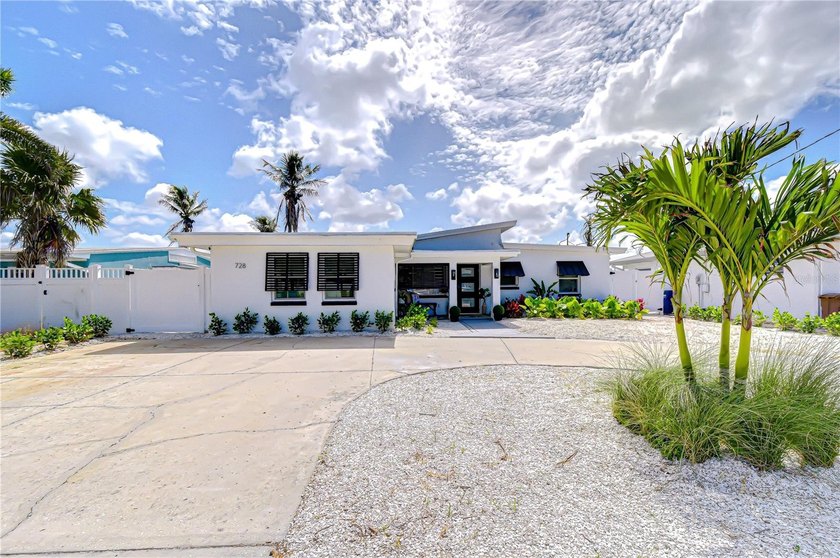 Unrivaled waterfront living takes center stage in this - Beach Home for sale in Madeira Beach, Florida on Beachhouse.com