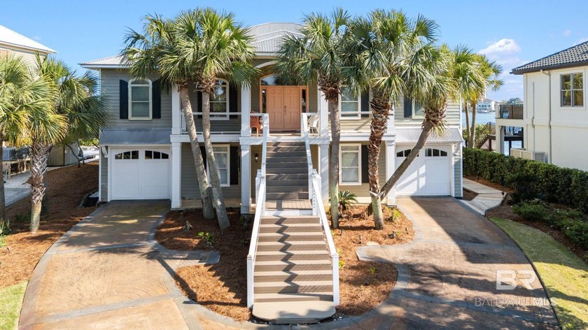 Waterfront living on Old River in the private gated community of - Beach Home for sale in Orange Beach, Alabama on Beachhouse.com
