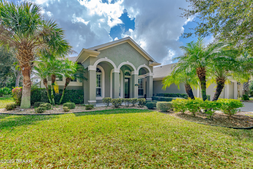Live a lifestyle of luxury in this STUNNING home nestled in - Beach Home for sale in Palm Coast, Florida on Beachhouse.com