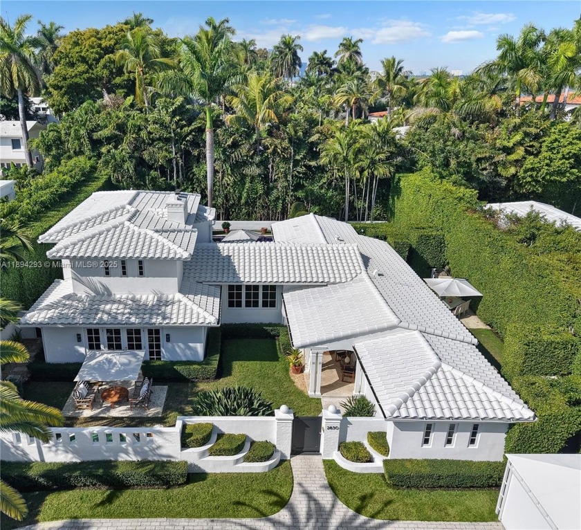 Discover island luxury with this stunning Mid-century modern - Beach Home for sale in Miami Beach, Florida on Beachhouse.com