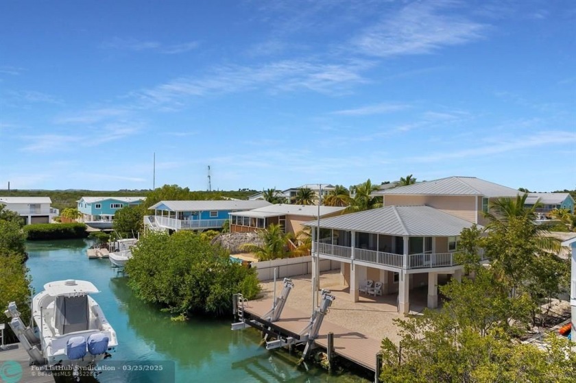 Meticulously maintained coastal retreat with more living space - Beach Home for sale in Ramrod Key, Florida on Beachhouse.com