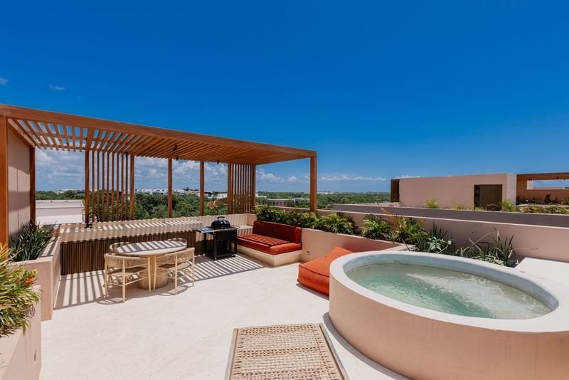 Nestled within the lush, protected jungle habitat of Aldea Zama - Beach Condo for sale in Tulum,  on Beachhouse.com