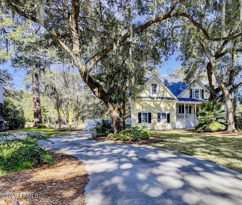 Nestled on a quiet street beneath stunning live oaks, this - Beach Home for sale in Beaufort, South Carolina on Beachhouse.com