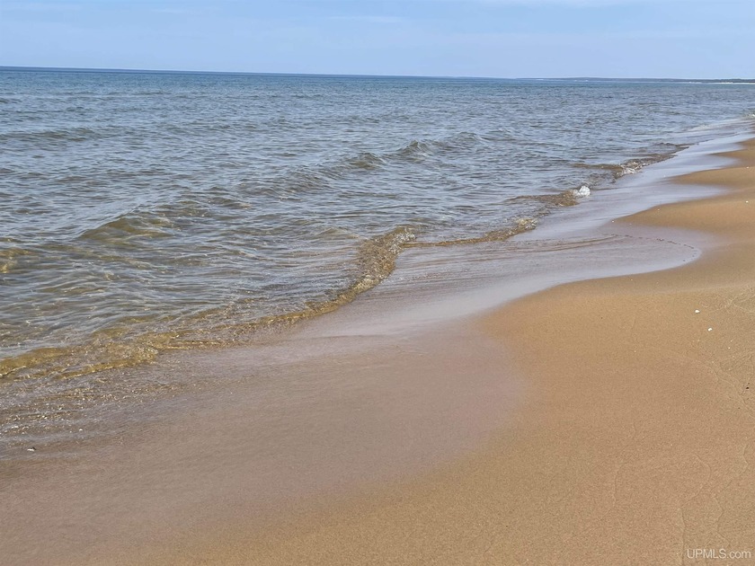 Offering 1,396 feet of exceptional Lake Michigan frontage and 47 - Beach Acreage for sale in Gulliver, Michigan on Beachhouse.com