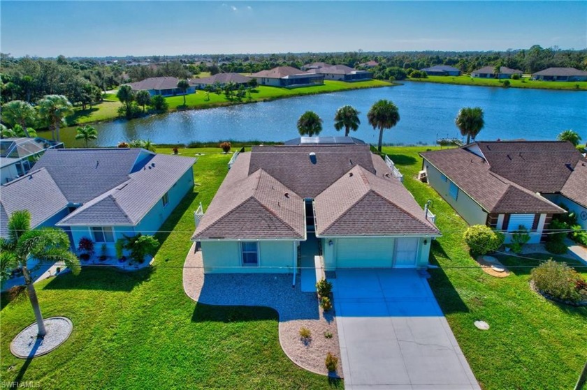 Panoramic Tranquil Lakefront Views overlooking the pool! What an - Beach Home for sale in Rotonda West, Florida on Beachhouse.com