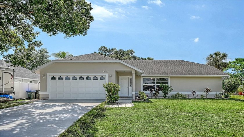 This beautifully refreshed 3-bedroom, 2-bathroom home spans 1 - Beach Home for sale in North Port, Florida on Beachhouse.com