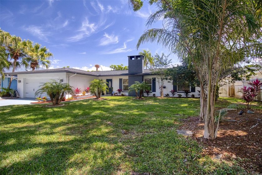 This tastefully renovated 4 bedroom, 2 bath, heated pool - Beach Home for sale in Clearwater, Florida on Beachhouse.com