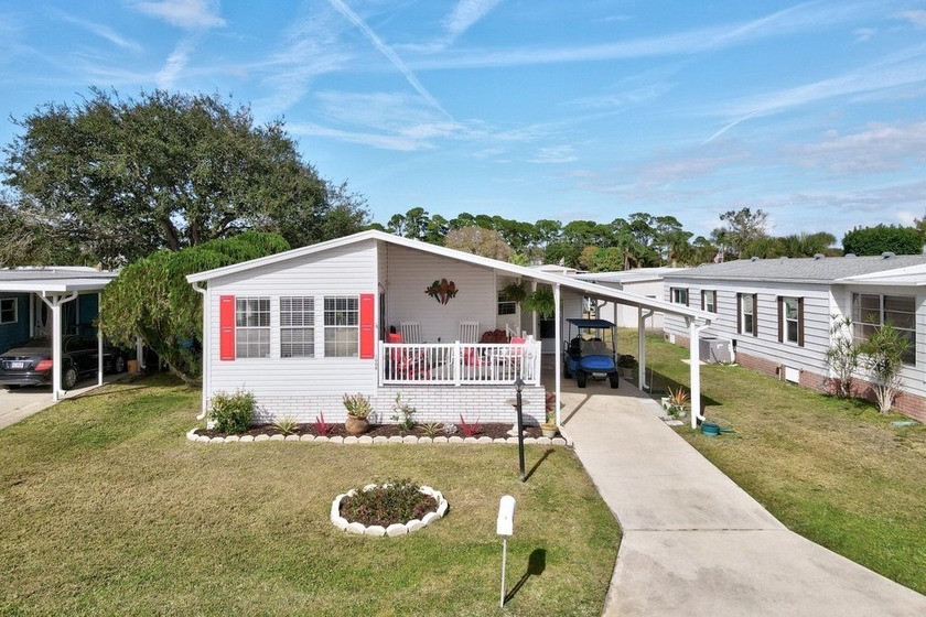 So so CUTE and SUPER Clean. Enjoy this adorable front patio - Beach Home for sale in Barefoot Bay, Florida on Beachhouse.com