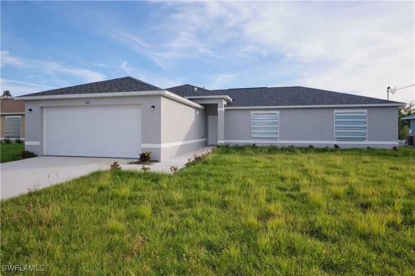 BRAND NEW  CANAL FRONT 3 BED 2 BATH 2 CAR GARAGE HOME! GRANITE - Beach Home for sale in Cape Coral, Florida on Beachhouse.com