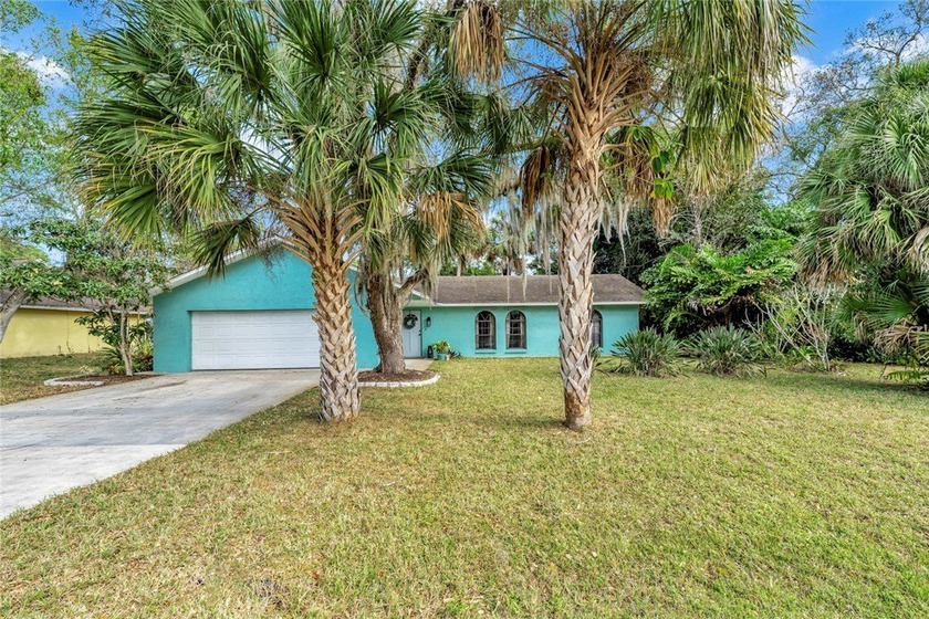 Charming 3BR/2BA/2CG home situated on a beautiful oak-shaded - Beach Home for sale in Vero Beach, Florida on Beachhouse.com