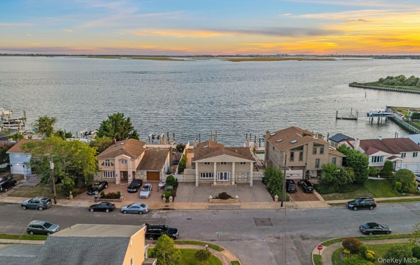 Nestled on the open bay in Baldwin, this stunning 4-bedroom, 2 - Beach Home for sale in Baldwin, New York on Beachhouse.com