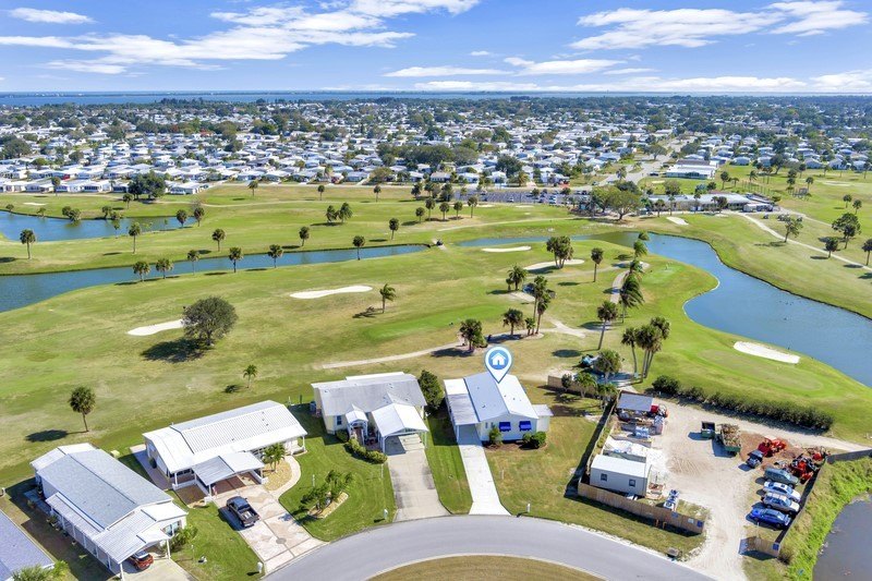 Rarely available directly on Golf Course. Enjoy the ideal - Beach Home for sale in Barefoot Bay, Florida on Beachhouse.com