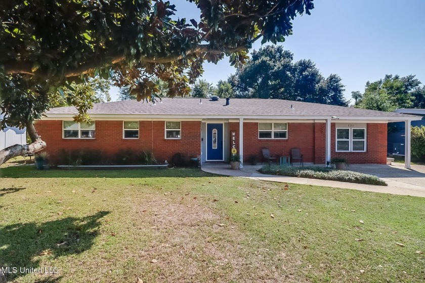 Nestled just a short drive from the beach, this move-in ready - Beach Home for sale in Gulfport, Mississippi on Beachhouse.com