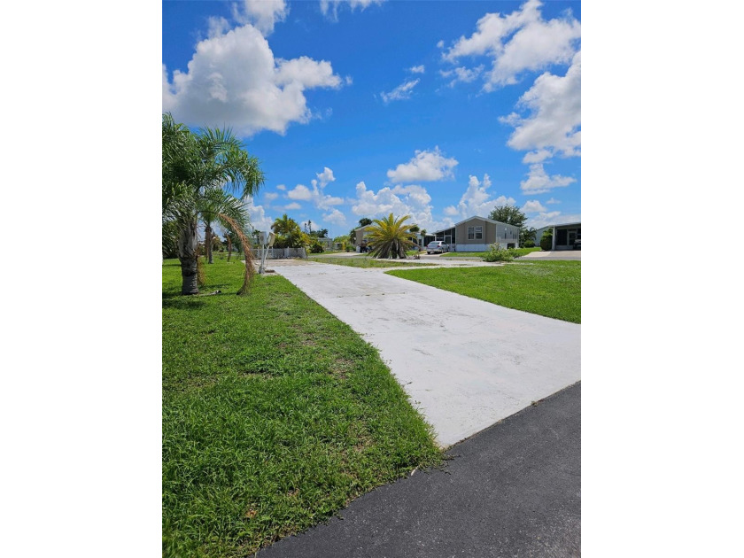 Great CORNER LOT in the desirable WATERFRONT COMMUNITY Village - Beach Lot for sale in Port Charlotte, Florida on Beachhouse.com