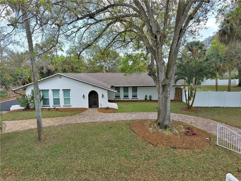 Meticulously updated four-bedroom, two-bath estate on a - Beach Home for sale in Vero Beach, Florida on Beachhouse.com