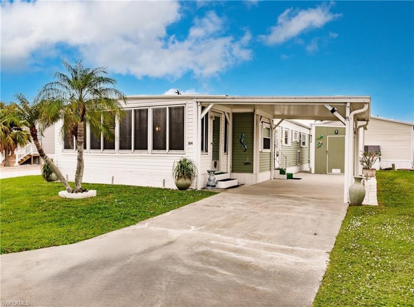 As soon as you enter this 55+ boating community, past Surprise - Beach Home for sale in Punta Gorda, Florida on Beachhouse.com