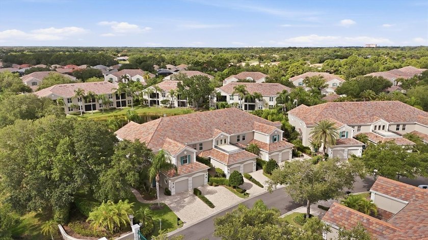 Nestled behind the gates of the highly sought-after Botanica on - Beach Condo for sale in Sarasota, Florida on Beachhouse.com