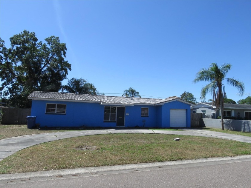 Opportunity awaits you with this three bedroom, two bath, one - Beach Home for sale in St. Petersburg, Florida on Beachhouse.com