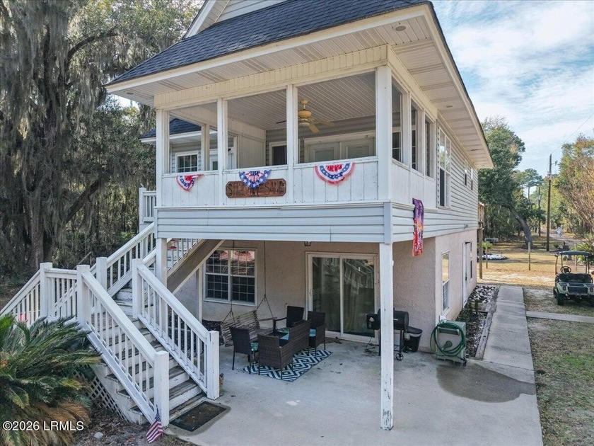 Discover the charm of island living at this spacious home on - Beach Home for sale in Saint Helena Island, South Carolina on Beachhouse.com