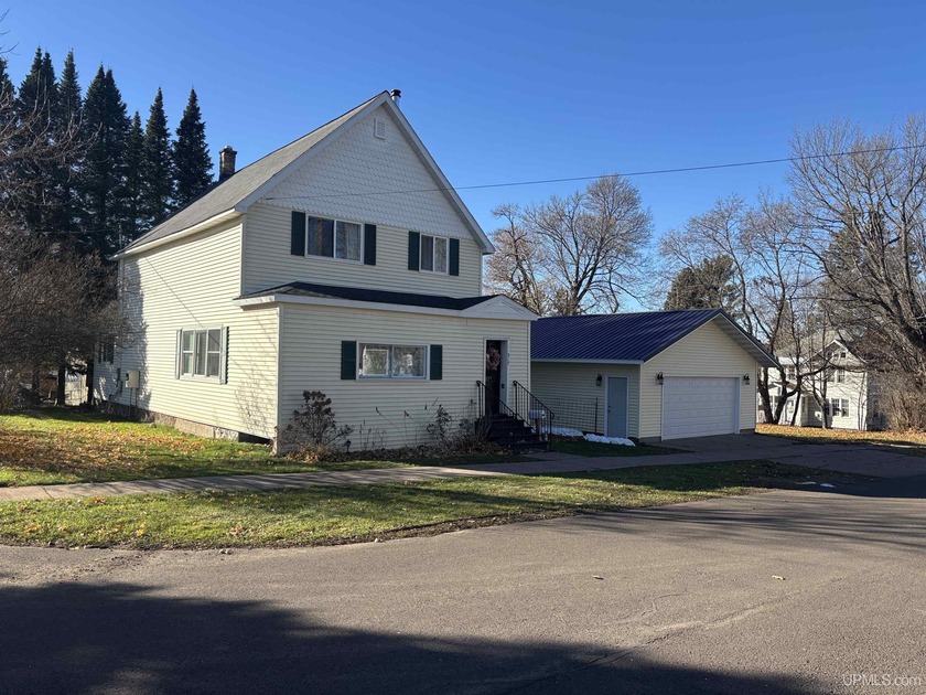 Welcome to this inviting 4-bedroom, 2-bath home with 2 car - Beach Home for sale in Ironwood, Michigan on Beachhouse.com