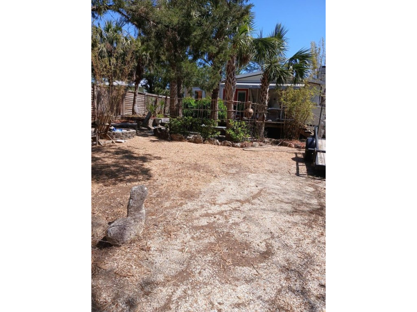 Almost 1/2 acre of property fenced in with large yard.  Super - Beach Home for sale in Cedar Key, Florida on Beachhouse.com