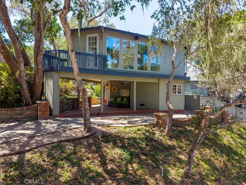 Let me take you on a whimsical journey to a house tucked under - Beach Home for sale in Cambria, California on Beachhouse.com