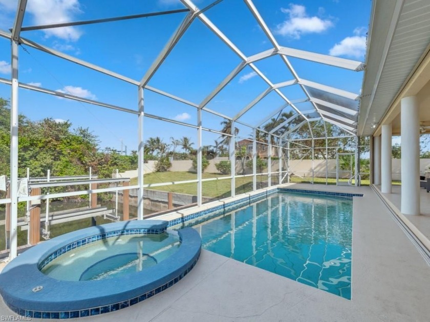 Bright, airy 3 bedroom plus den, canal front home with soaring - Beach Home for sale in Naples, Florida on Beachhouse.com