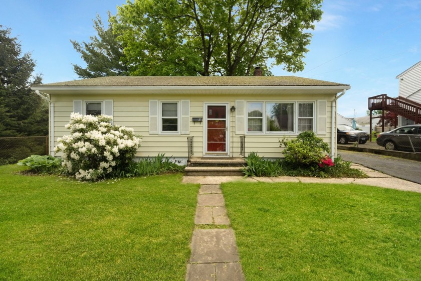 Opportunity awaits with this charming 3 bedroom home nestled in - Beach Home for sale in Stamford, Connecticut on Beachhouse.com
