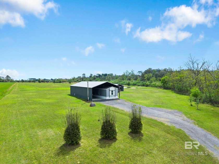Discover the ultimate country retreat on this stunning 15-acre - Beach Home for sale in Elberta, Alabama on Beachhouse.com