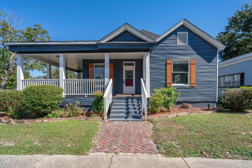 This charming Southern-style home boasts 6 bedrooms and 2.5 - Beach Home for sale in Gulfport, Mississippi on Beachhouse.com