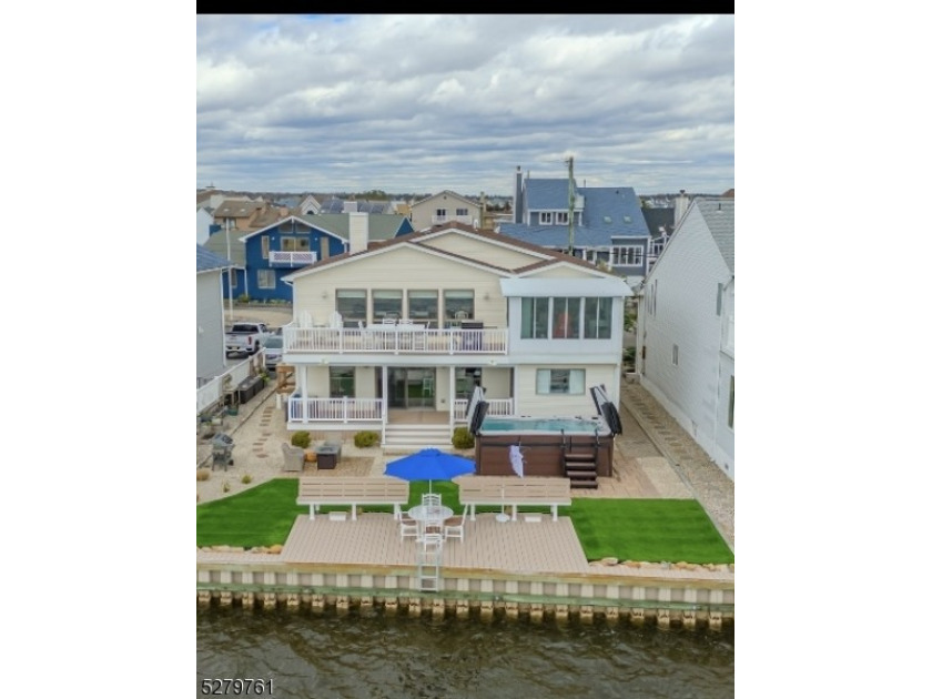 Indulge in bayfront luxury living with 4 bedrooms, 2 spa-like - Beach Home for sale in Brick, New Jersey on Beachhouse.com