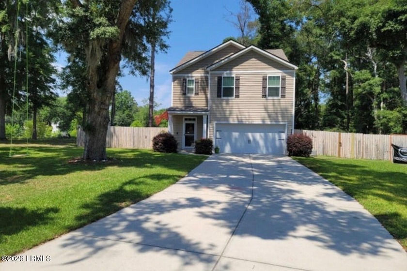 Located in the sought-after Tidewater Creek community on Lady's - Beach Home for sale in Beaufort, South Carolina on Beachhouse.com