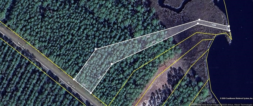 Wooded residential lot on the deep and beautiful New River. The - Beach Lot for sale in Carabelle, Florida on Beachhouse.com